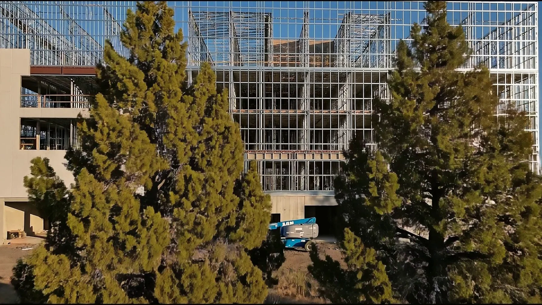 A five-story cold-formed steel framed storage building at golden hour in the Central Oregon high desert